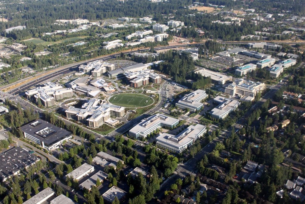 Ariel photo of client's campus. Many large office buildings.
