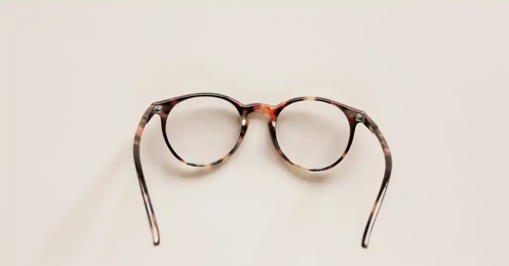 Tortoiseshell glasses on a white background for OT network security.