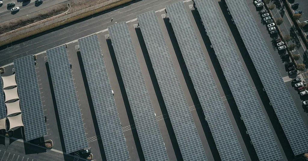 Large solar panel installation on a commercial building rooftop.