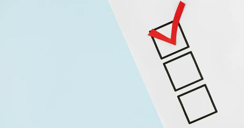 Checklist with a red checkmark for OT network modernization.